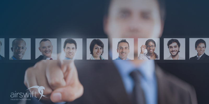 Recruiter selecting candidates on a screen